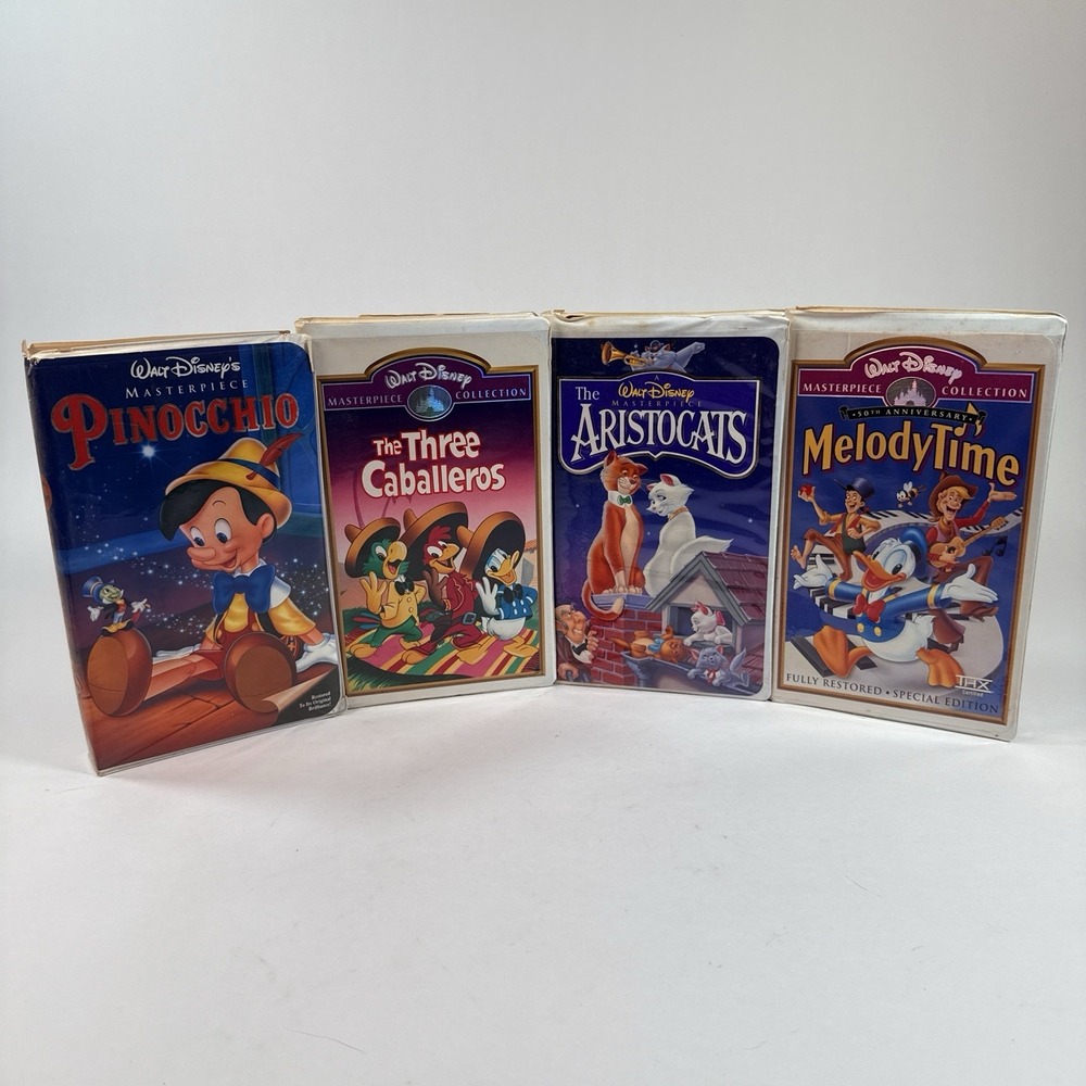 Disney VHS Lot 4 Pinocchio Aristocats Three Caballeros Melody Time Clamshell